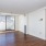 a room with a wood floor and a wood floor