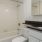 a bathroom with a tub sink and toilet